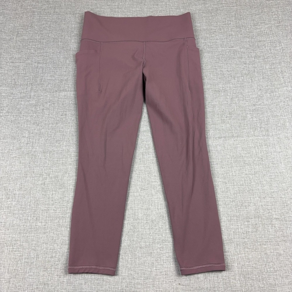 Athleta Leggings Womens M Purple Salutation Stash 7/8 Tight Ankle Pockets Yoga